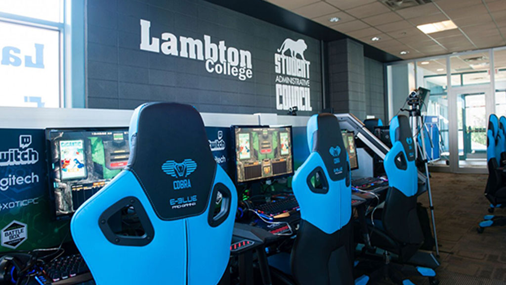 Photo of Lambton College eSports facility with gaming computers and chairs